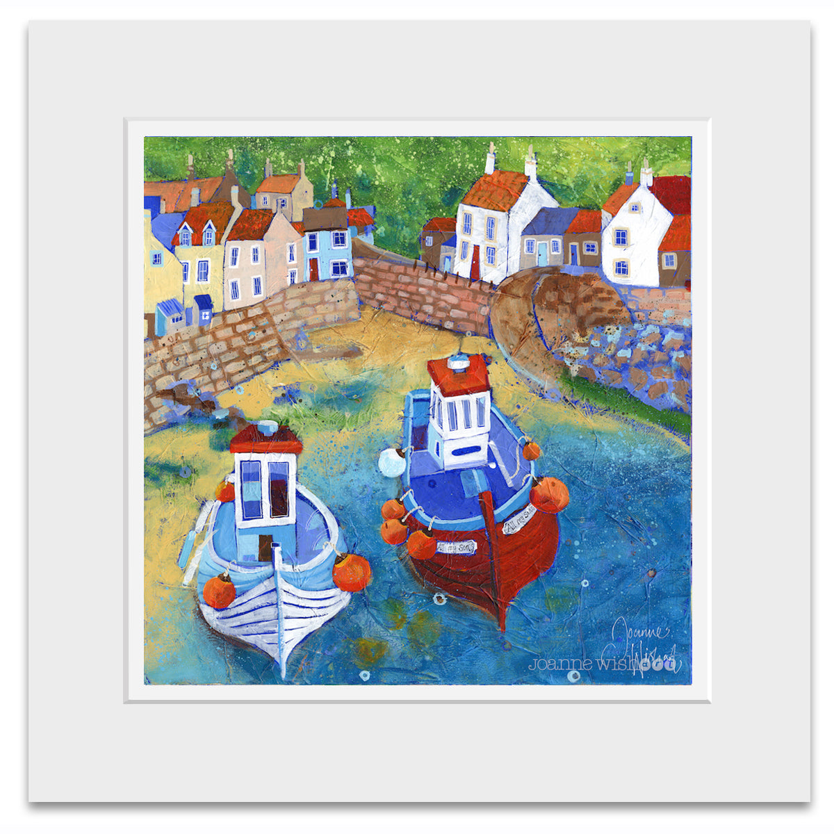 A mounted art print of fishing boats in Staithes harbour.