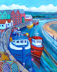 A painting of Amble harbour where one red and one blue large fishing boats rest against the harbour wall. Pink green and white buildings hug the curve of the river coquet. Warkworth castle lies in the distance. You can see colourful lobster pots in the foreground.