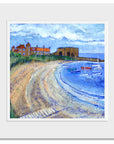 A mounted print of Beadnell Bay featuring sailing boats and the Lime kilns.