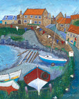 An uplifting print of Craster harbour in northumberland with boats and bunting bin the bay.
