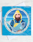 Beardy Fisherman holding a fish design on a greetings card.