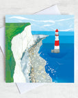 A coastal greetings card showing beachy head lighthouse as seen from a bird eye view.