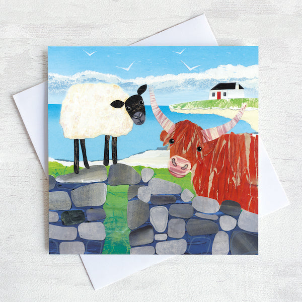 A greetings card featuring a sheep and a highland cow.