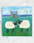 A friendship greetings card featuring two sheep chatting in a field on a scottish farm.