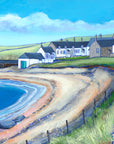 A white painted stone cottage and outbuildings sit above the white sandy beach with dunes to the left. There is a path trodden through a grassy field leading to the cottage. THe sky is blue with a few distant clouds.