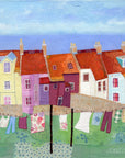 A fine art print of Pittenweem in Fife featuring washing blowing on the line.
