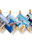 A selection of colourful greetings cards inspired by the seaside. Including Donkeys and beach huts.