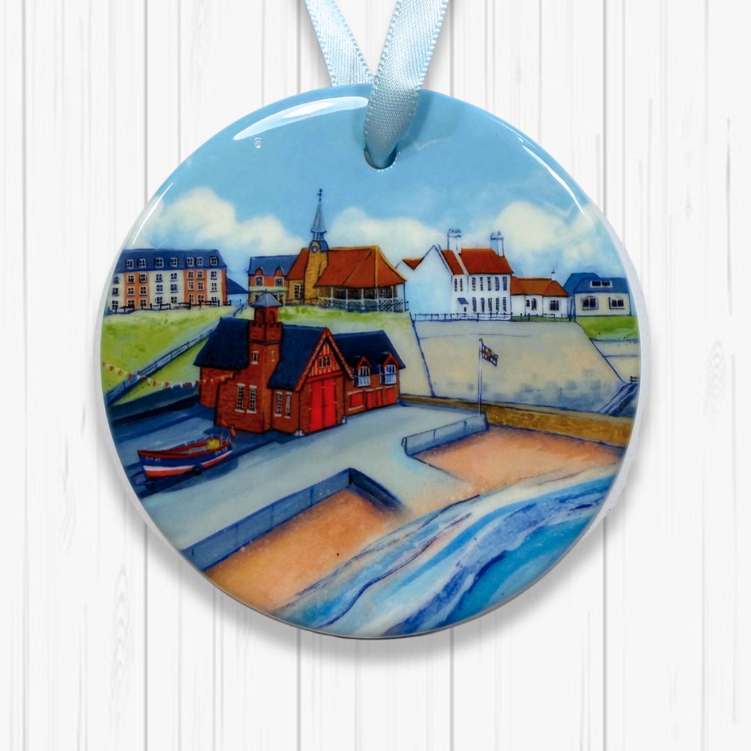 Tree Decoration of Cullercoats lifeboat station and the beach with waves caressing the shoreline 