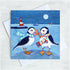 Card with two Puffins wearing scarves against a snowy landscape with a lighthouse.