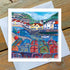 A colourful greetings card featuring a vibrant painting of the cod and losyter pub in Staithes with lobster pots in the foreground.