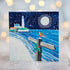 A greetings card featuring a white lighthouse  with a signpost directing people to St Mary's. A robin bird sits on top of the post. 