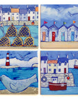 Set of 4 seaside ceramic coasters featuring colourful houses seals, fishing boats and beach huts.