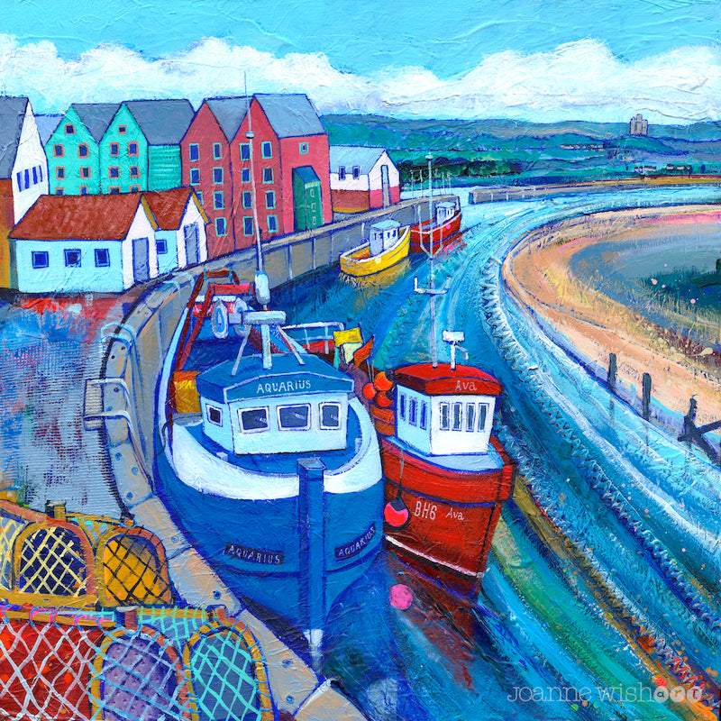A painting of Amble harbour where one red and one blue large fishing boats rest against the harbour wall. Pink green and white buildings hug the curve of the river coquet. Warkworth castle lies in the distance. You can see colourful lobster pots in the foreground. 