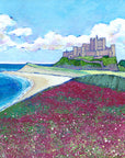 A print of the iconic bamburgh castle perched above a sweeping field of purple wildflowers.