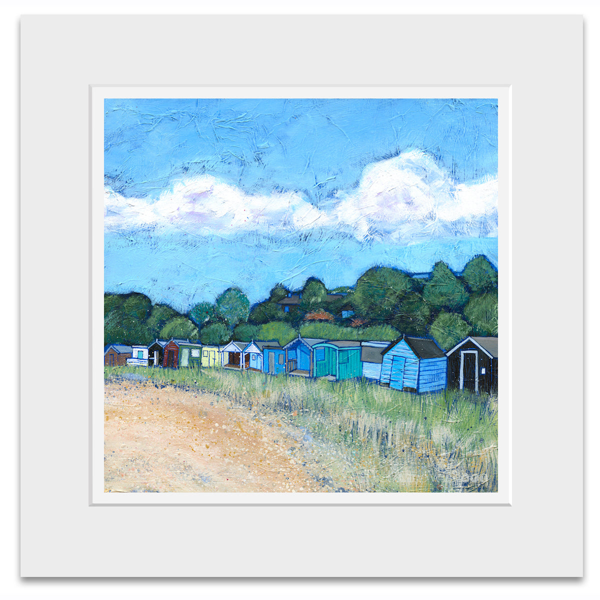 A mounted print of beach huts on Coldingham Bay sands.