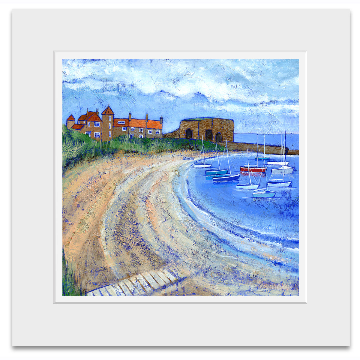 A mounted print of Beadnell Bay featuring sailing boats and the Lime kilns. 