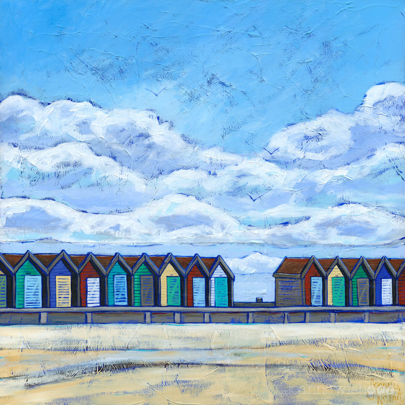 A fine art print of a row of colourful beach huts on Blyth beach.