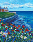 Browns bay in cullercoats is depicted in this brightly painted picture featuring a swathe of wildflowers in front of the deep blue sea.