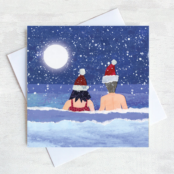 A Christmas Card featuring Sea swimmers in Santa Hats.