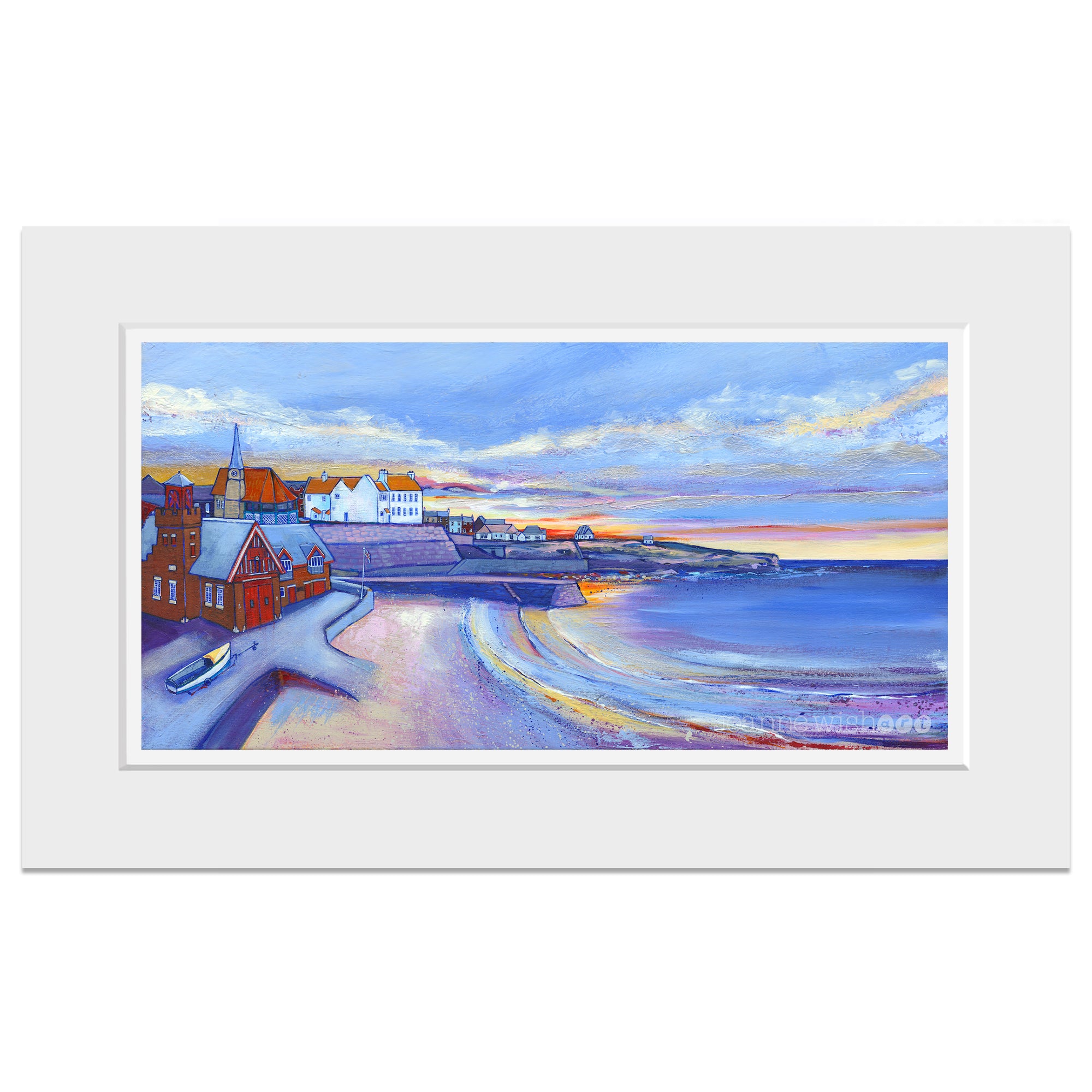 A mounted print of Cullercoats with a dramatic winter sky.