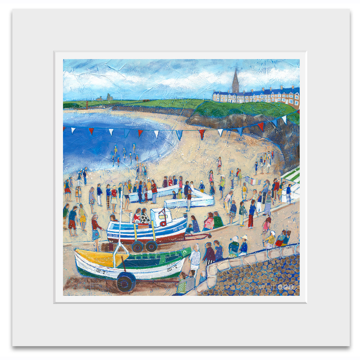 A mounted print of Cullercoats beach bustling with people on harbour day.