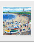 A mounted print of Cullercoats beach bustling with people on harbour day.