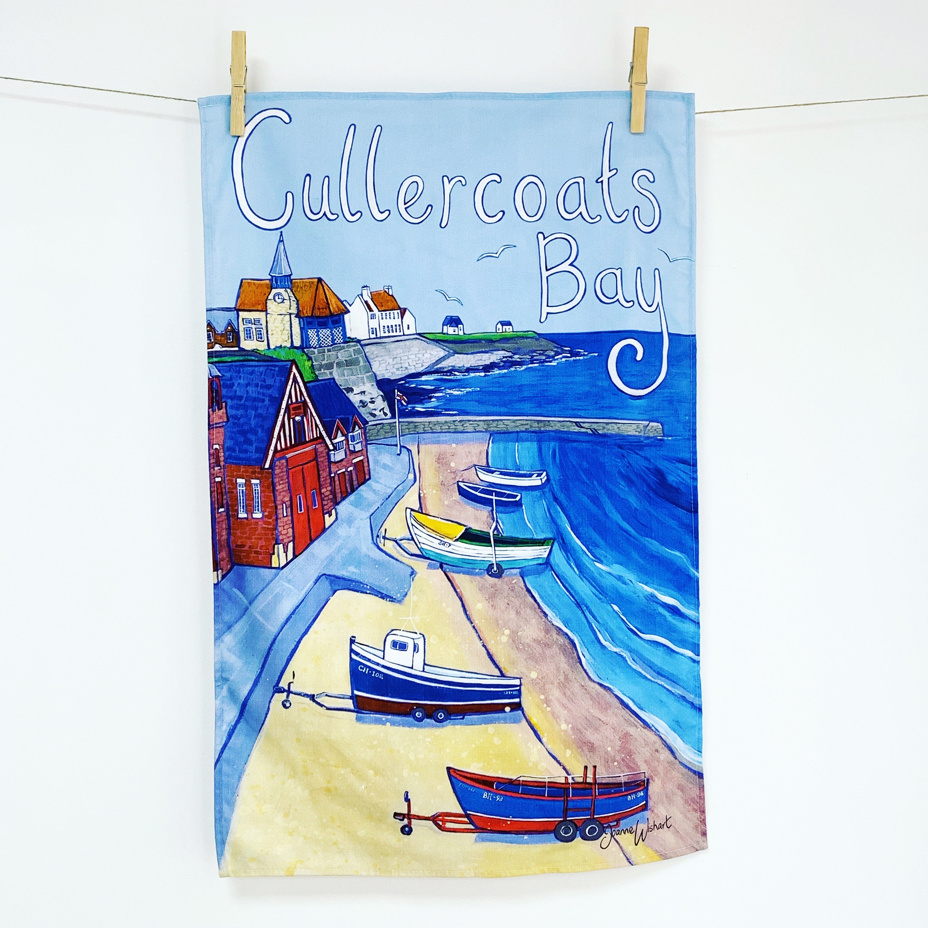 A tea towel of Cullercoast Bay.