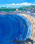 a print of Eyemouth beach featuring Gunsgreen house and the harbour in the distance.