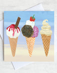 A greetings card featuring ice creams in a cone. one with a flake and monkeys blood.