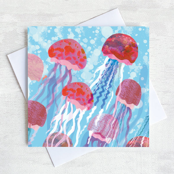 A greetings card featuring jellyfish in a bubbly sea.