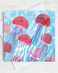 A greetings card featuring jellyfish in a bubbly sea.