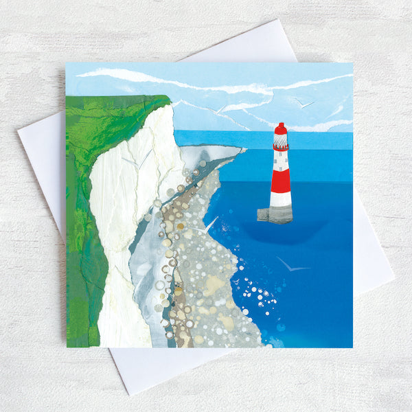 A coastal greetings card showing beachy head lighthouse as seen from a bird eye view.