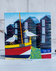 The net sheds at hastings with quirky gulls perched on the cable boats.