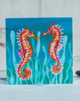 A colourful sea horses greetings card