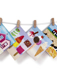 A washing line showcasing a selection of summery greetings cards by Joanne Wishart