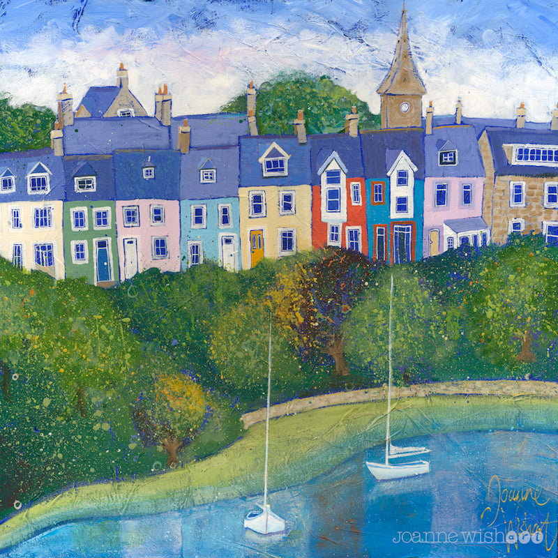 A row of colourful houses perch above the river Aln in this charming Northumberland print by local artist Joanne Wishart