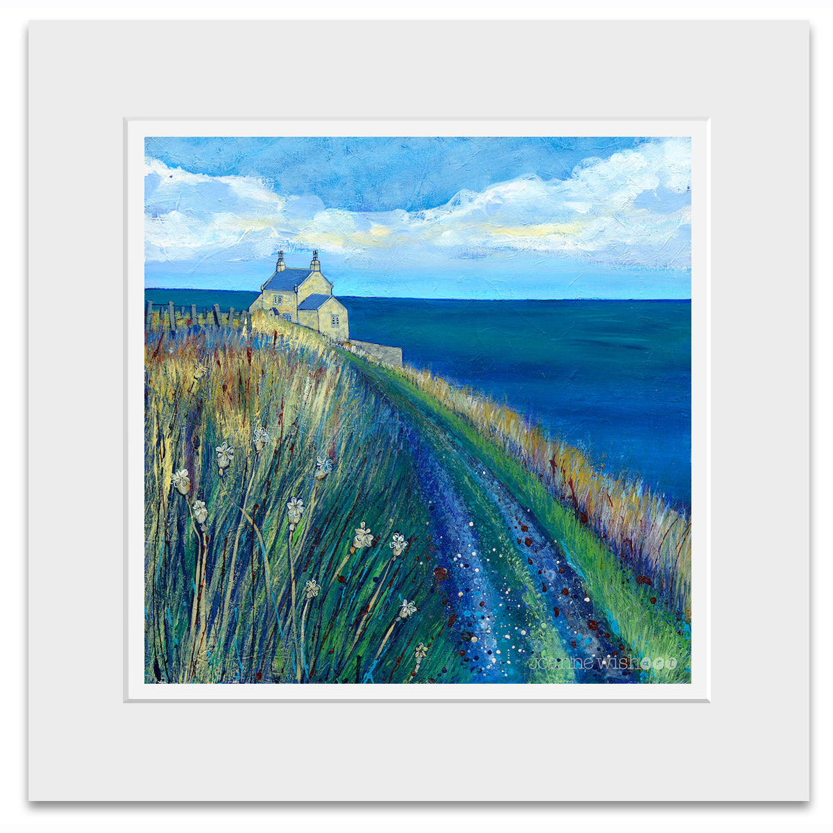 A mounted print of the Bathing house on the northumberland coastal path.