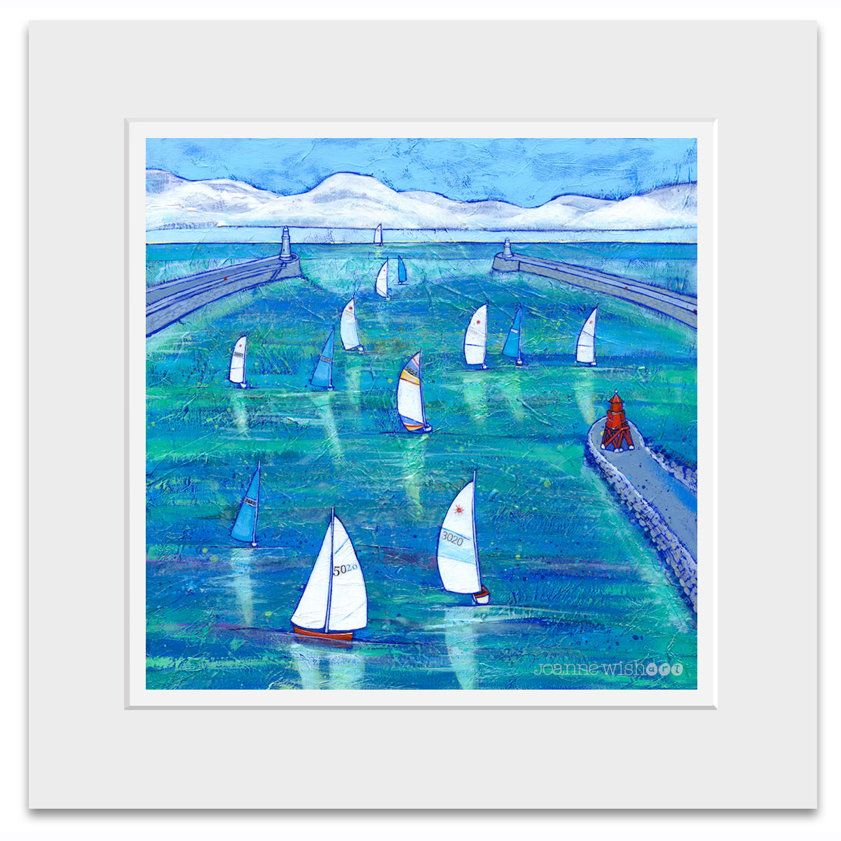 A mounted print of sailing boats on the river tyne.