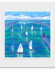 A mounted print of sailing boats on the river tyne.