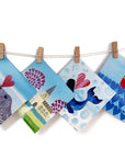 A selection of 6 love and sea themed art cards. featuring heart motifs.