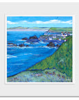 A mounted print of St Abbs from a distant view point.