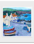 A mounted print of St Abbs cottages and fishing boats .