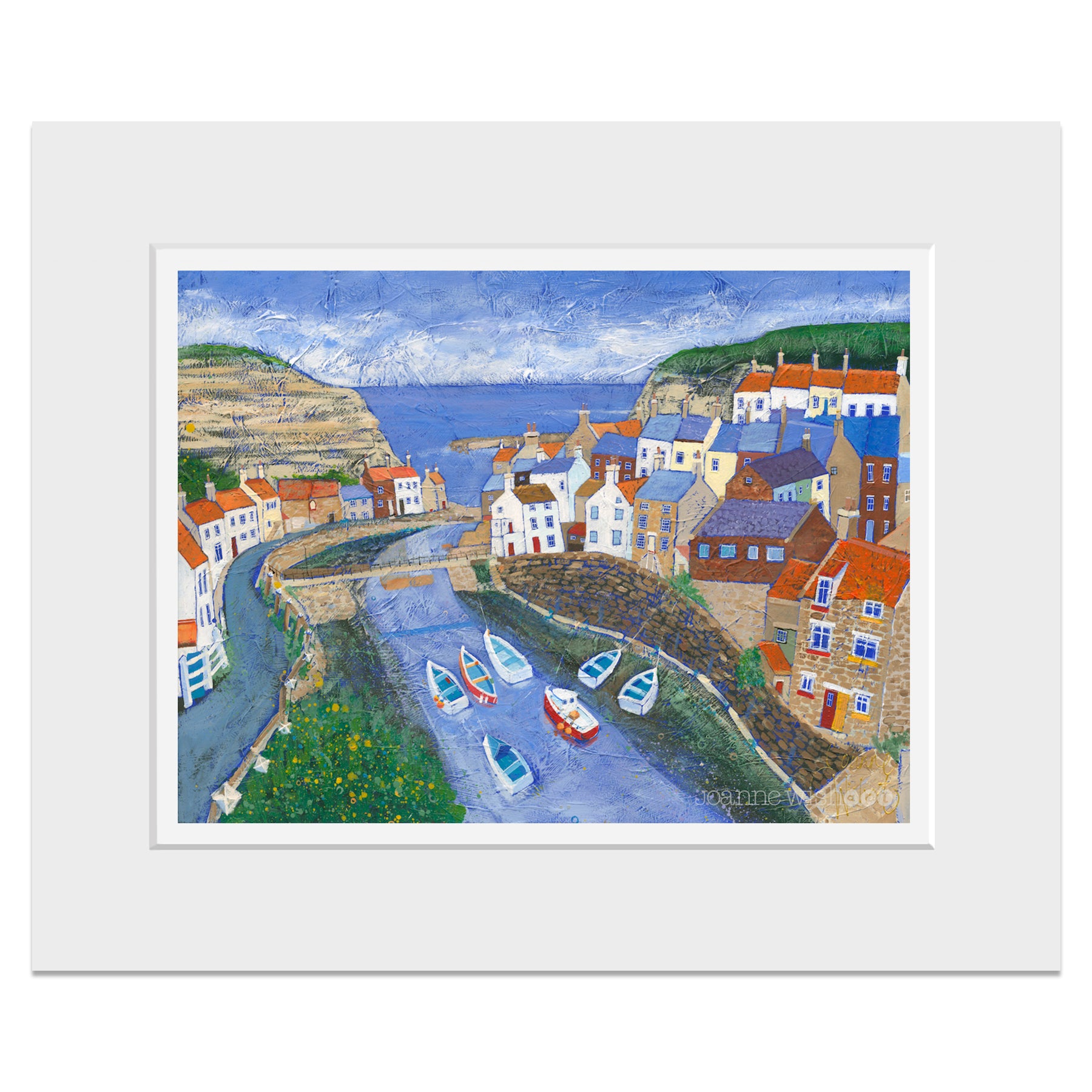 A mounted print of Staithes village looking down the beck.