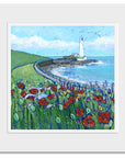 A mounted print of St Mary's Island featuring bright red poppies in the foreground.