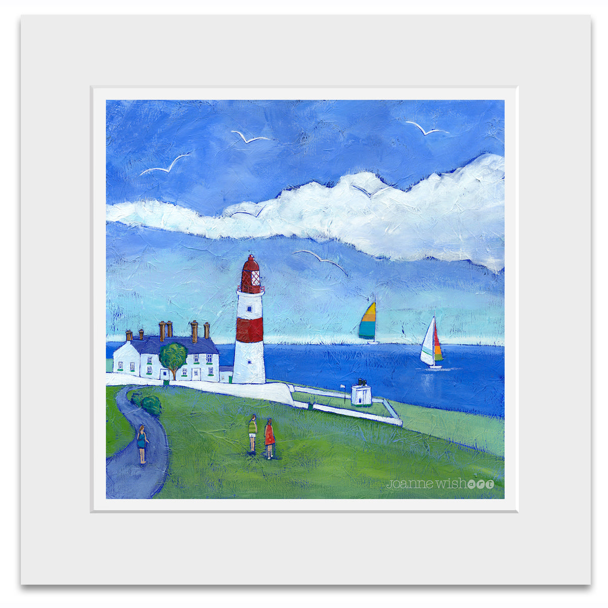 A mounted print of Souter lighthouse featuring sailing boats out at sea and people walking by.
