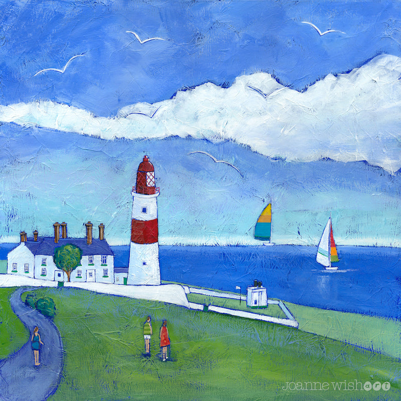 A colourful print of Souter lighthouse with sailing boats cruising on the water .