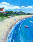 A print of Whitburn Beach featuring the bents and noble boats bobbing on the water.