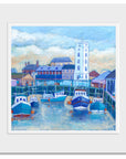 A mounted art print of North shields fish quay with a winter sky.